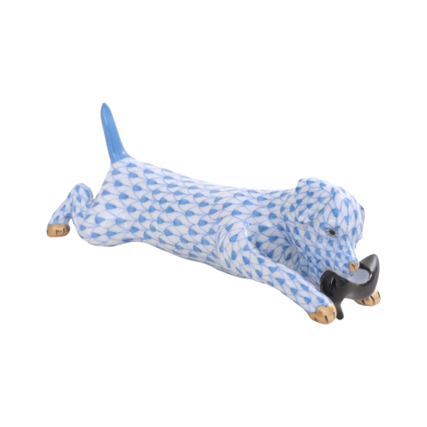 Puppy, chewing a shoe